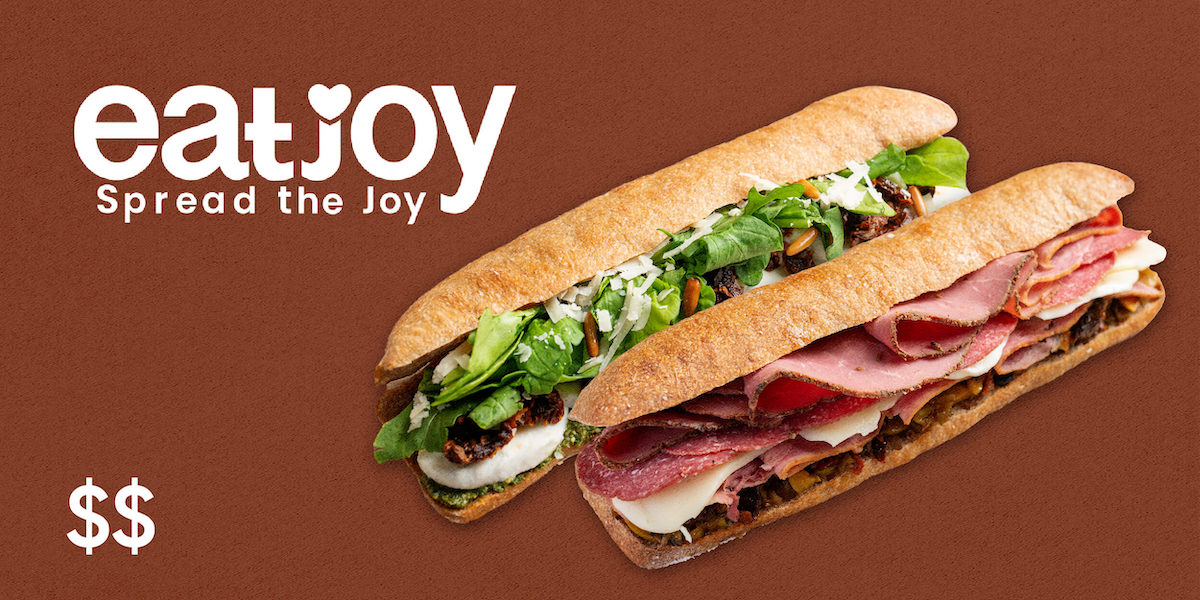 Two sandwiches from Eatjoy side by side with the logo on the left side and $$