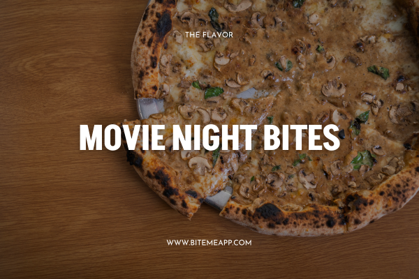 A mushroom creamy pizza with one slice coming out a bit from Ned's Pizza.