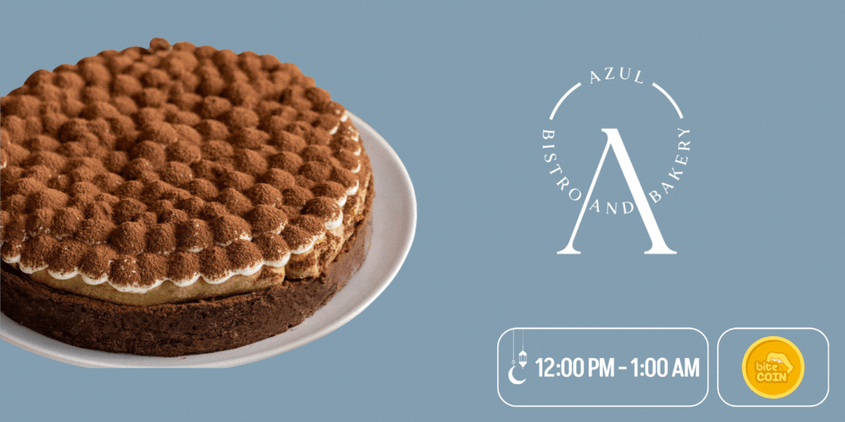 A chocolate cake from Azul Pastry with the icon of biteCOIN spinning in the bottom right