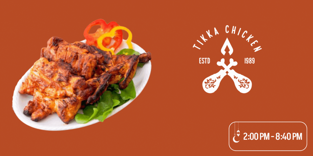 A plate of Tandoori Chicken from Tikka Chicken with bell peppers and arugula.